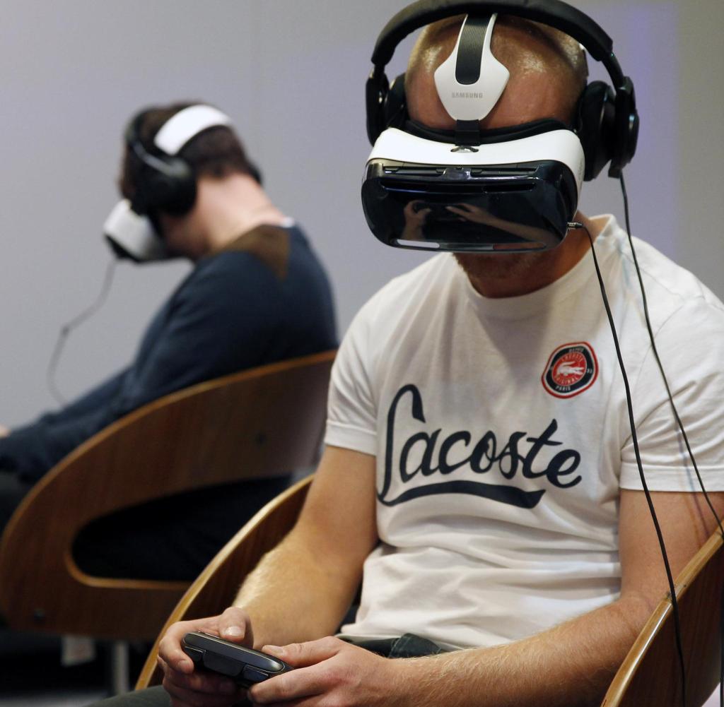 PARIS, FRANCE - OCTOBER 29: A gamer plays a game with the virtual reality head-mounted display 'Oculus Rift' during the International Games Week on October 29, 2014 in Paris, France. The display transfers the eye movements to the game in real time. International Games Week Paris takes place from October 29 till November 02, 2014. (Photo by Chesnot/Getty Images) Getty ImagesGetty Images