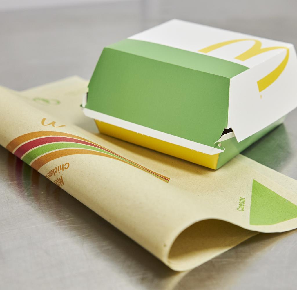 The grass paper replaces the typical burger box at McDonald's Deutschlandburger. This saves tons of waste