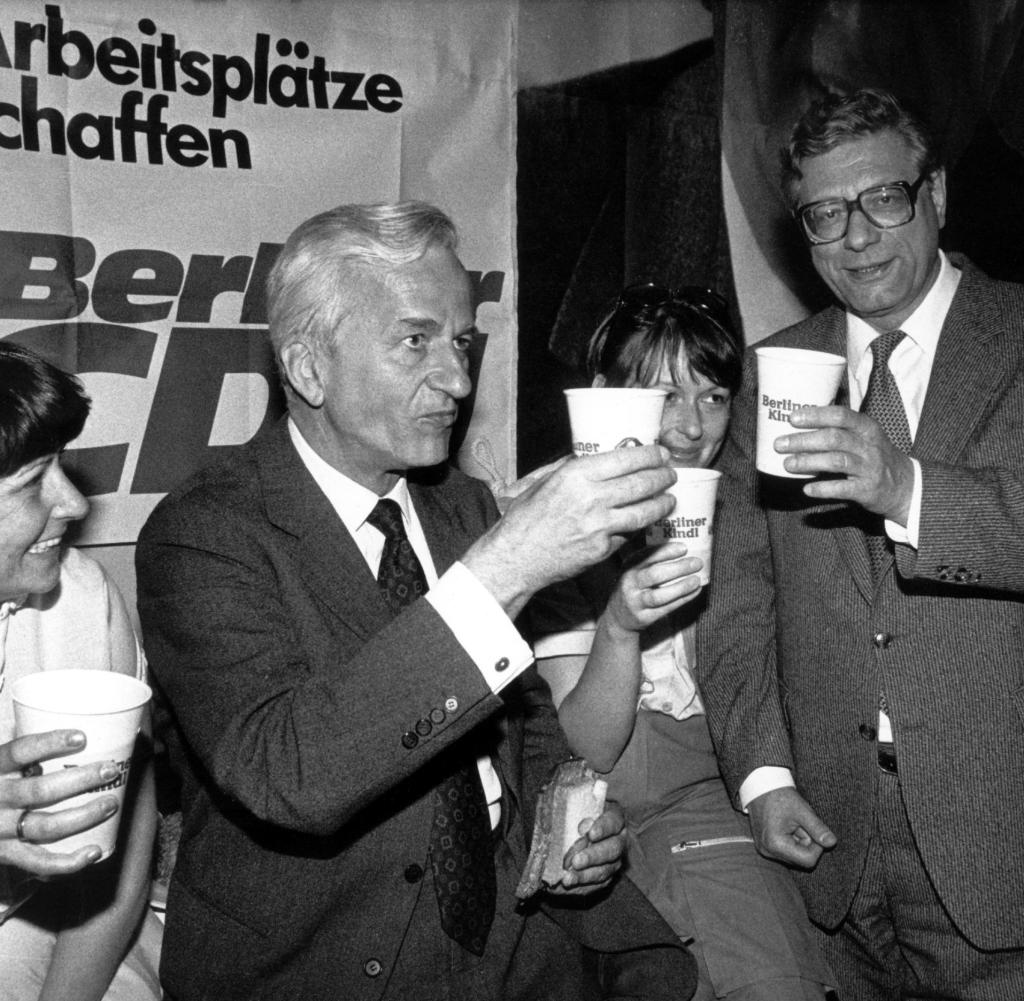 After the CDU's victory in the elections to the Berlin House of Representatives on 10 May 1981, leading candidates Richard von Weizsäcker (M) and Peter Lorenz (r) prost themselves.