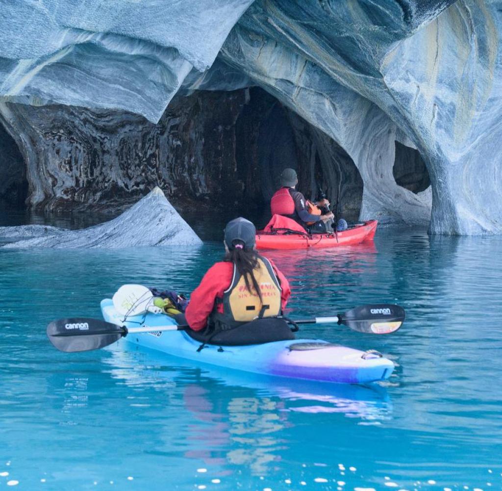 Kayakers explore the unique caves at Lago General Carrera in Patagonia, Chile
